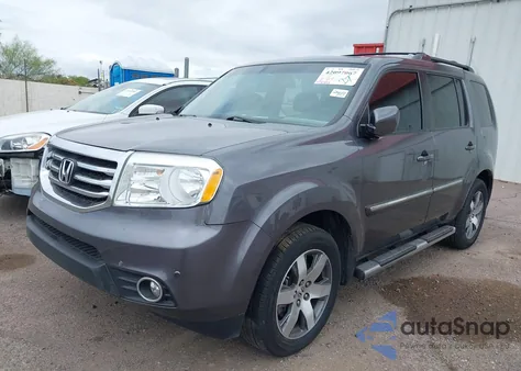 2014 Honda Pilot Touring z USA, uszkodzony, nr VIN 5FNYF4H90EB033259